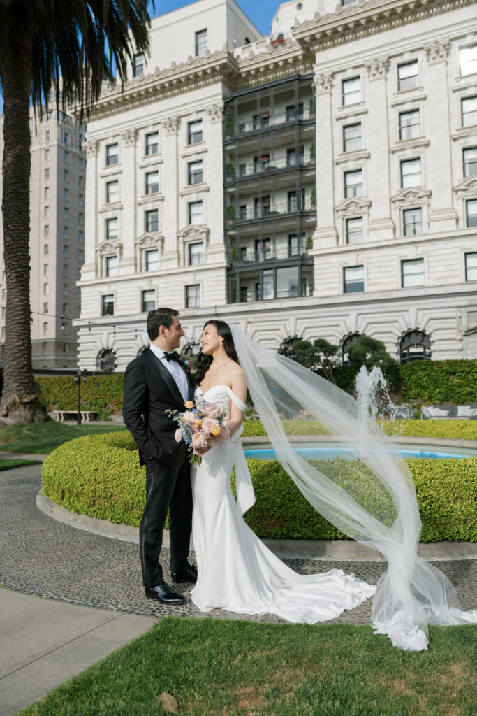 Bride and groom first look at Fairmont San Francisco rooftop wedding