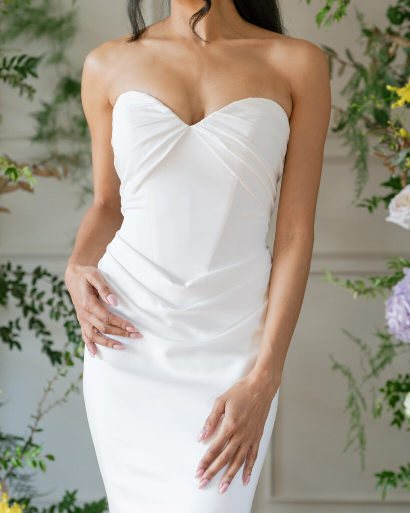 Fashion-driven bridal photography capturing clean lines and refined details in a Lace & Liberty dress.